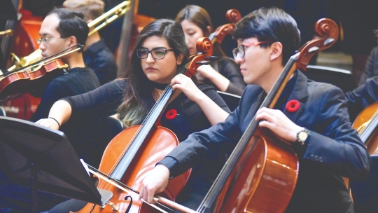 University of Toronto students playing instruments on Remembrance Day